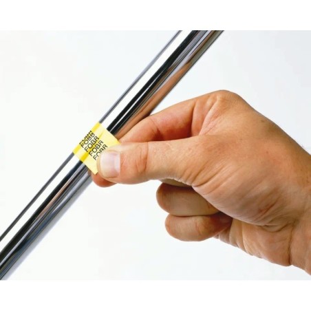 Cinta laminada flexible. Texto negro sobre fondo Amarillo. 18mm (8mts de largo)